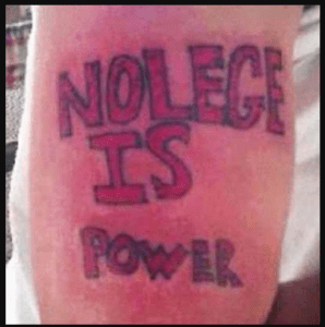 misspelled forearm tattoo to be removed