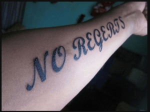 no regerts tattoo mistake on arm